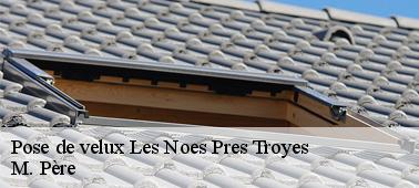 La fenêtre de toit ayant un moteur dans la ville de Les Noes Pres Troyes et ses environs